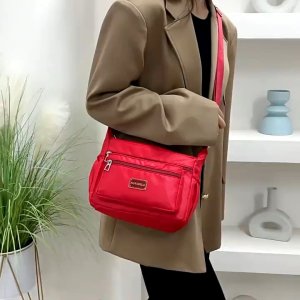 women casual shoulder bag sling bag navy blue with multiple zippered compartments adjustable