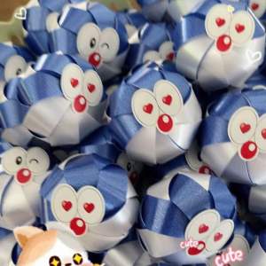 เหรียญโปรยทาน "หน้าโดเรม่อน"ใส่เหรียญที่หลังได้