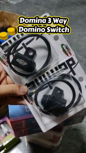 Domina 3 way domino switch with black cable and connector in clear plastic packaging.