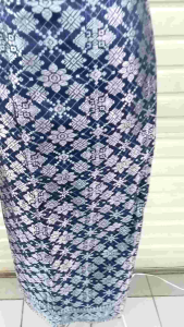 ROK SPAN SONGKET MOTIF TERBARU\\n\\n Apa Itu Rok Songket?\\n\\nRok Songket adalah salah satu jenis pakaian tradisional yang berasal dari Indonesia, khususnya dari daerah Sumatera Barat dan Jambi. Rok Songket terbuat dari kain songket yang memiliki motif yang indah dan unik, serta dipadukan dengan rok span yang memberikan kesan modern.\\n\\n Sejarah Rok Songket\\n\\nSejarah Rok Songket dapat ditelusuri hingga abad ke-15, saat Kerajaan Pasai dan Majapahit berkembang pesat. Pada masa itu, kain songket menjadi simbol status sosial dan kekayaan. Rok Songket sendiri mulai berkembang pada abad ke-20, saat seniman dan desainer mulai mengadaptasi kain songket ke dalam desain pakaian modern.\\n\\n Bahan Rok Songket Berkualitas\\n\\nRok Songket terbuat dari bahan songket yang berkualitas tinggi, yang biasanya terbuat dari benang sutra atau benang nilon. Kualitas bahan sangat penting untuk menciptakan Rok Songket yang tahan lama dan nyaman dikenakan. Beberapa hal yang perlu diperhatikan saat memilih bahan Rok Songket antara lain:\\n\\n* Jenis benang\\n* Tekstur kain\\n* Motif kain\\n\\n Rok Songket Cocok Untuk Acara Formal\\n\\nRok Songket cocok digunakan pada acara formal seperti pernikahan, resepsi, dan acara-acara penting lainnya. Desain Rok Songket yang modern membuatnya terlihat lebih elegan dan anggun, namun tetap mempertahankan unsur tradisional.\\n\\n Desain Rok Songket Modern\\n\\nDesain Rok Songket modern biasanya terdiri dari beberapa elemen, seperti:\\n\\n* Motif songket yang indah dan unik\\n* Rok span yang memberikan kesan modern\\n* Potongan rok yang ramping dan anggun\\n* Detail tambahan seperti bordir atau kancing\\n\\n Tips Memilih Rok Songket yang Tepat\\n\\nBeberapa tips untuk memilih Rok Songket yang tepat antara lain:\\n\\n* Sesuaikan dengan bentuk tubuh\\n* Pilih warna yang sesuai dengan acara\\n* Perhatikan detail dan kualitas bahan\\n\\n Bagaimana Menggunakan Rok Songket dengan Benar?\\n\\nBerikut adalah beberapa tips untuk menggunakan Rok Songket dengan benar:\\n\\n* Kenakan Rok Songket pada acara formal\\n* Sesuaikan dengan pakaian atasan yang sesuai\\n* Padukan dengan aksesori yang sesuai\\n\\n Cara Merawat Rok Songket\\n\\nBerikut adalah beberapa tips untuk merawat Rok Songket:\\n\\n* Jemur di tempat teduh dan jangan langsung terkena sinar matahari\\n* Setrika dengan suhu rendah\\n* Simpan di tempat yang kering dan bersih\\n\\n Perpaduan Warna Rok Songket\\n\\nPerpaduan warna Rok Songket sangat penting untuk menciptakan penampilan yang harmonis. Beberapa tips untuk memadukan warna Rok Songket antara lain:\\n\\n* Pilih warna yang sesuai dengan acara\\n* Padukan dengan warna-warna netral\\n* Hindari kombinasi warna yang kontras\n}