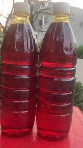 Dầu màu điều đỏ chai 1 lít dùng làm bánh tráng trộncơm rang kho cá  dùng cho các món ăn…