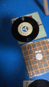 7-Inch Vinyl Record for Wall Decor or Display Preloved Music-Themed Decorative Disc for Room Café or Event Use