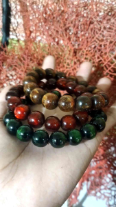 GELANG TASBIH AKAR BAHAR TALI ARUS MERAH TEMBUS CAHAYA