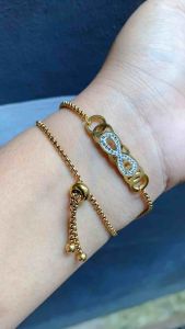 Gelang Serut Infinity Permata Gold Titanium Cxb27