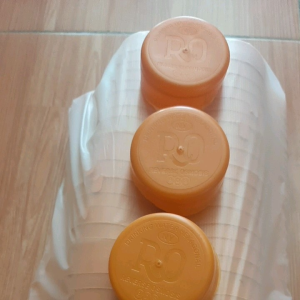 Tutup Galon Isi Ulang RO Warna Orange Dengan Fisik Bagian Atas Datar Dipergunakan Untuk Galon Kemasan 19 Liter Dengan Quantity Tiap Kemasan 100 Pieces (AL318)