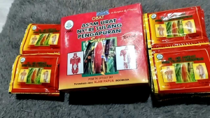 Buah merah kapsul asam urat pegel linu