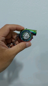 {\n \"article\": \" Keychain Gantungan Kunci Turbo Sound Lighter Import Warna Rainbow