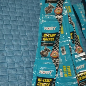 Koby Hi-Temp Grease packets with motorcycle graphic on blue packaging net weight 100g suitable for high-temperature applications.