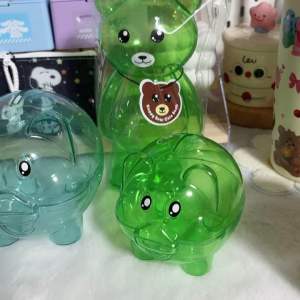 พร้อมส่ง กระปุกออมสินหมูเขียว ออมสินหมู ออมสินหมูสีใส ออมสินหมูเขียว