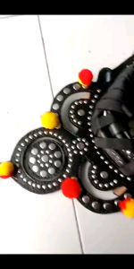 Kalung Domba Gongseng Kulit Asli Buatan Garut: Perhiasan Tradisional yang Gagah