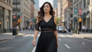 Preloved black lace dress with cold shoulder cutouts and V-neckline. Suitable for outdoor events.