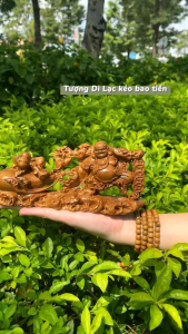 Tượng gỗ di lặc kéo bao tiền gỗ Bách Xanh để xe ô tô cực đẹp