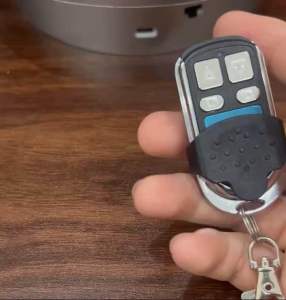 Remote Cửa Cuốn Học Lệnh Thông Minh 433Mhz.Điều Khiển Cửa Cuốn Nền Xanh Inox Kèm Pin.