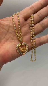 สร้อยคออิตาลี 2 กษัตริย์ เงิน+ทอง ลายเม็ดข้าวสาร พร้อมจี้พญาครุฑล้อมด้วย พลอยนพเก้า สวยหรูดูแพง สร้อยคอมีน้ำหนัก 1 บาท ความยาว 18 นิ้ว 20 นิ้ว 24 นิ้ว