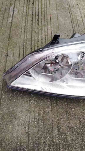 Headlight for Honda Civic 2004 - 2005 per side clear lens with mounting bracket.