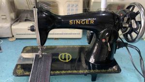 Singer sewing machine electric with motor and foot pedal