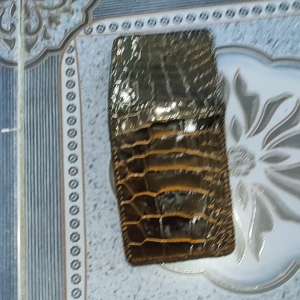 dompet pendek kulit buaya rajut merauke papua