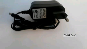 Adaptor Charger Mesin pijat kaki Terapi lutut 12Volt 1000mA