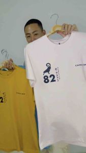 เสื้อยืด คอกลม แขนสั้น สกรีนลาย