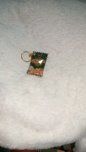 25 pcs Assorted Trinkets Keychain Variety Pack with Colorful Packaging and Unique Designs