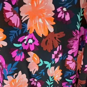 เกาหลีผ้ายืดITY พิมลายเป็นผ้าม้วนตัดแบ่งเป็นเมตรหน้ากว้าง60"พื้นดำลายดอกส้มชมพูบานเย็น สีสด สวย