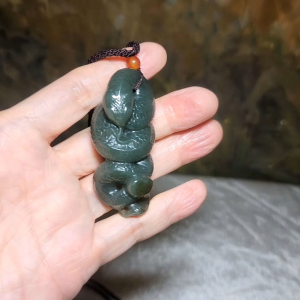 Premium Nephrite caramel brown blue green good greasiness 3 dimensional Snake Copper Coin Jade pendant (with certificate)