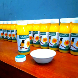 NatureBird NECTAR 140 ML Nektar Kolibri Konin Sogon\\n\\n Apa Itu NatureBird NECTAR 140 ML?\\n\\nNatureBird NECTAR 140 ML adalah makanan burung berkicau yang dirancang khusus untuk memberikan nutrisi optimal bagi burung berkicau Anda. Produk ini merupakan nektar yang dibuat dengan bahan-bahan berkualitas tinggi, sehingga aman dan sehat untuk burung berkicau Anda.\\n\\n Nutrisi Burung Berkicau\\n\\nBurung berkicau membutuhkan nutrisi yang seimbang untuk tetap sehat dan aktif. NatureBird NECTAR 140 ML dirancang untuk memberikan nutrisi lengkap bagi burung berkicau Anda, termasuk protein, karbohidrat, lemak, vitamin, dan mineral esensial. Produk ini juga kaya akan serat alami yang membantu menjaga sistem pencernaan burung berkicau Anda.\\n\\n Komposisi & Manfaat\\n\\nNatureBird NECTAR 140 ML terbuat dari bahan-bahan alami yang dipilih dengan cermat, seperti nektar alami, buah-buahan segar, dan sayuran organik. Produk ini juga mengandung vitamin dan mineral esensial yang penting bagi kesehatan burung berkicau Anda. Manfaat utama dari penggunaan NatureBird NECTAR 140 ML adalah sebagai berikut:\\n\\n- Memberikan nutrisi optimal bagi burung berkicau Anda\\n- Membantu menjaga sistem pencernaan burung berkicau Anda\\n- Meningkatkan stamina dan daya tahan burung berkicau Anda\\n- Mengurangi risiko penyakit pada burung berkicau Anda\\n\\n Cara Menggunakan Nektar Kolibri Konin Sogon\\n\\nBerikut adalah langkah-langkah penggunaan NatureBird NECTAR 140 ML:\\n\\n1. Pastikan botol nektar telah dibuka dengan benar dan tidak ada kerusakan pada tutupnya.\\n2. Tuangkan nektar ke dalam wadah makanan burung berkicau Anda.\\n3. Berikan nektar kepada burung berkicau Anda sesuai dosis dan frekuensi pemberian yang direkomendasikan.\\n\\n Dosis dan Frekuensi Pemberian\\n\\nUntuk mendapatkan hasil terbaik, berikan NatureBird NECTAR 140 ML kepada burung berkicau Anda sesuai dosis dan frekuensi pemberian yang direkomendasikan. Berikut adalah panduan umum untuk dosis dan frekuensi pemberian:\\n\\n- Dosis: 1-2 sendok teh per hari\\n- Frekuensi pemberian: Setiap hari\\n\\nNamun, dosis dan frekuensi pemberian dapat disesuaikan berdasarkan kebutuhan dan kondisi burung berkicau Anda. Selalu konsultasikan dengan ahli burung berkicau atau dokter hewan Anda jika Anda memiliki pertanyaan atau kekhawatiran tentang dosis dan frekuensi pemberian.\\n\\n Keuntungan Menggunakan NatureBird NECTAR 140 ML\\n\\nBerikut adalah beberapa keuntungan menggunakan NatureBird NECTAR 140 ML bagi burung berkicau dan pemiliknya:\\n\\n Keuntungan bagi Burung\\n\\n- Memberikan nutrisi optimal bagi burung berkicau Anda\\n- Membantu menjaga sistem pencernaan burung berkicau Anda\\n- Meningkatkan stamina dan daya tahan burung berkicau Anda\\n- Mengurangi risiko penyakit pada burung berkicau Anda\\n\\n Keuntungan bagi Pemilik Burung\\n\\n- Mudah digunakan dan tidak memerlukan persiapan khusus\\n- Aman dan sehat untuk burung berkicau Anda\\n- Dapat membantu meningkatkan kualitas hidup burung berkicau Anda\\n\\n Kesimpulan\\n\\nNatureBird NECTAR 140 ML adalah makanan burung berkicau yang dirancang khusus untuk memberikan nutrisi optimal bagi burung berkicau Anda. Produk ini mengandung nektar alami, buah-buahan segar, sayuran organik, serta vitamin dan mineral esensial yang penting bagi kesehatan burung berkicau Anda. Dengan menggunakan NatureBird NECTAR 140 ML, Anda dapat membantu menjaga kesehatan dan kualitas hidup burung berkicau Anda.\n}