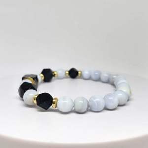 MEG Azure Noir Sequence bracelet with blue lace agate and black onyx beads.