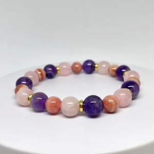 MEG Pastel Trio Rhythm bracelet with amethyst rose quartz and rhodochrosite beads.