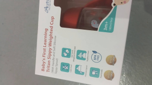 AUTUMNZ BABYS FIRST LEARNING TRITAN SIPPY WEIGHTED CUP WITH HANDLE 180ML ASSORTED