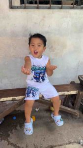 67 SIX SEVEN KIDS Terno Short Muscle Tee Kids - White tank top and shorts set with colorful 67 graphic and character design.