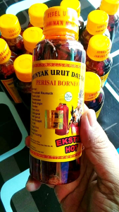 minyak urut dayak ibu Ida Kalimantan minyak pijat gosok herbal ekstra hot 250ml