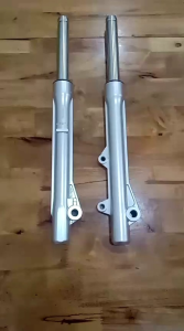 SHOCK DEPAN KOMPLIT AS+TABUNG KHARISMASUPRA X 125