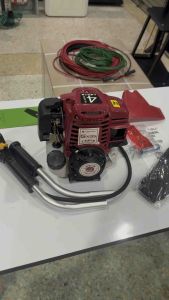 หัวตัดหญ้า4จังหวะTomitsu + อุปกรณ์ ไม่รวมก้าน สีแดง