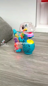 Mainan Anak Dinos Transparan Gear Lampu Musik Toys