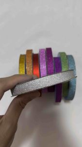 ริบบิ้นกากเพชร เบอร์ 2 (10 แถม 1) กว้าง 12 มิล ยาว 25 หลา ใช้ห่อเหรียญโปรยทาน ทำโบว์