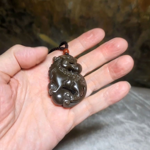Premium Nephrite deep caramel brown greasy 3 dimensional Pi Xiu pendant (with certificate)
