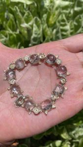 สร้อยข้อมือแก้วโป่งข่าม “แก้วขนเหล็กใส” (ตัวเรือนเงินแท้)