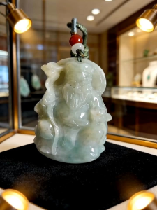 jadeite Myanmar jade pendant with tu di gong