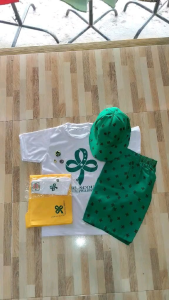 Gsp set type B 6 in 1: white t-shirts with green clover logo green patterned shorts white socks green clover hats yellow and pink clover pouches.