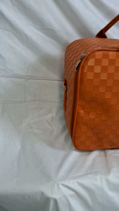 travel bag motif kotak warna orange  tas mudik  tas berpergian