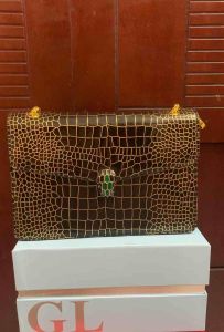 Túi da thật MOVDARL đầu rắn