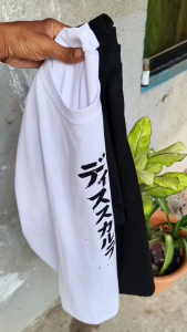 Buy 1 take 1 White and black t-shirts with Japanese text and "DISKARTE" on front. Buy 1 take 1 promotion new arrival premium look