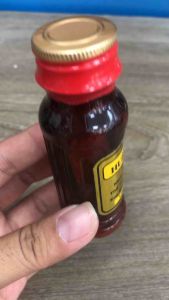 Dầu xoa bóp Huế chai nhựa ấm ko nóng gắt
