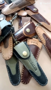 {\n    \"article\": \" Sarung Pipa Once Gading Model Klasik Kulit Asli ukuran 12 cm 14 cm 16 cm