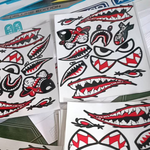 tem tấm logô ticker răng cá mập KT 18x23cm