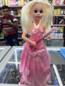 Dancing Doll in pink and gold dress with feathered hat holding microphone.