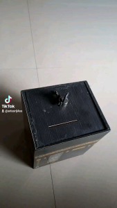 celengan kabah bahan serabut kayu plus kunci