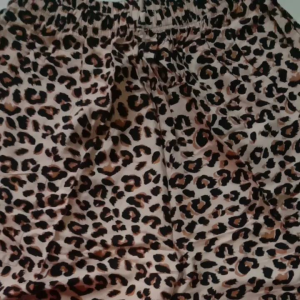 celana pendek leonpard bahan rayon panjang sepaha