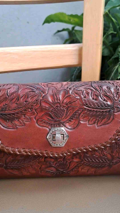 Hàng Si túi cluk cầm tay da mộc khắc